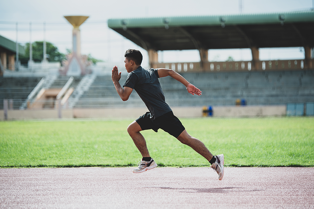 athlete-standing-all-weather-running-track